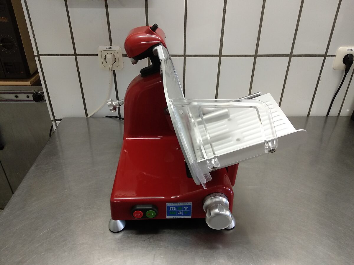 Rote Aufschnittmaschine für Wurst und Käse